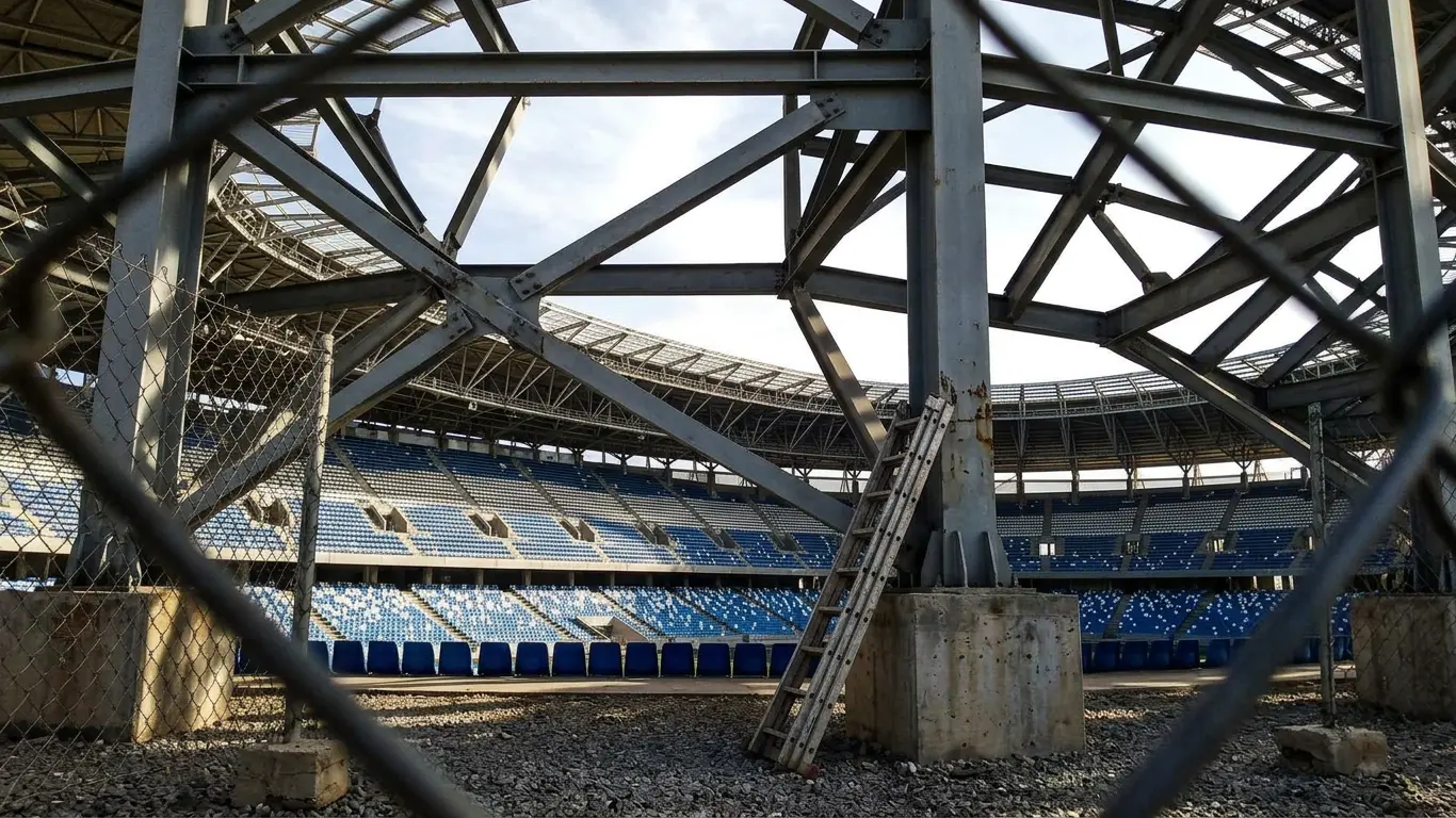 Ibn Batouta Stadium curved end-stand detail, showing the raised tier added during the 2020-2023 expansion, Tangier